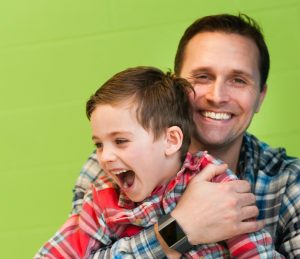 Boy and Dad Smiling